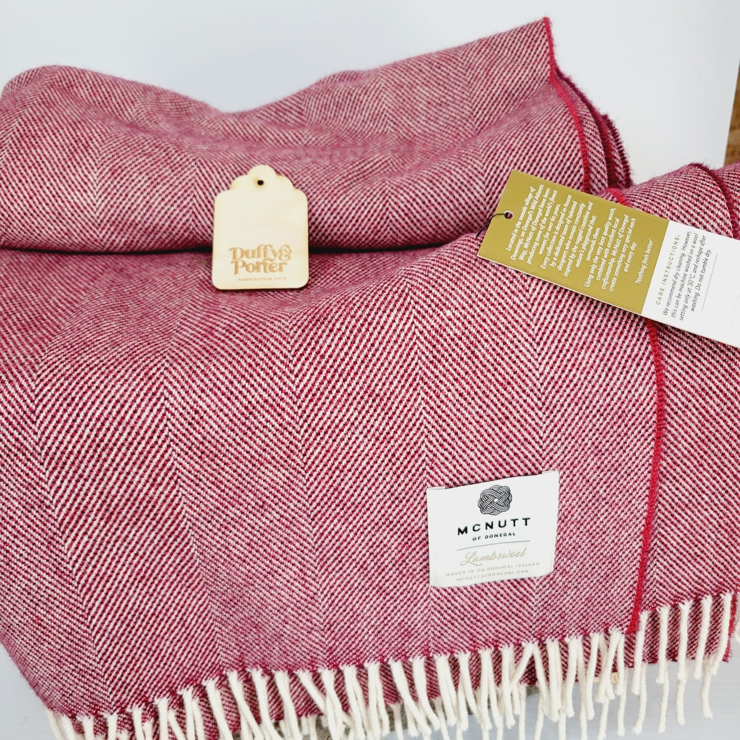 McNutt Lambswool Throw Supersoft Spotted Cranberry