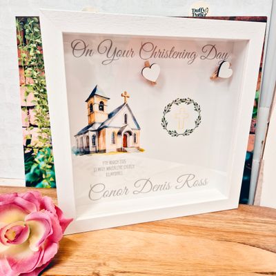A frame for a christening, personalised with childs name