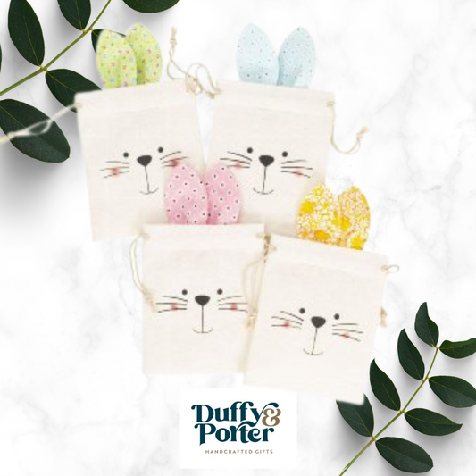 Fabric rabbit bag with face and rabbit ear 26,5x14,5cm asst.