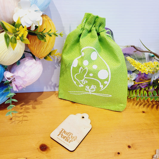 Jute bag green & natural with eastern design h=18cm w=13cm asst.