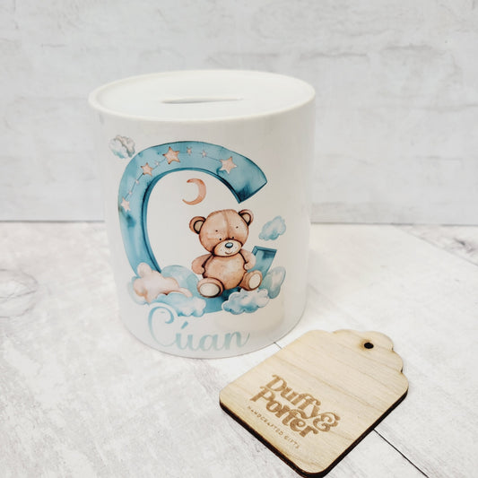 Money box. Teddy initial Blue