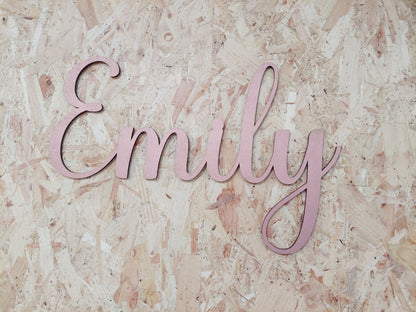 Pink wooden name 'Emily' on a textured beige background