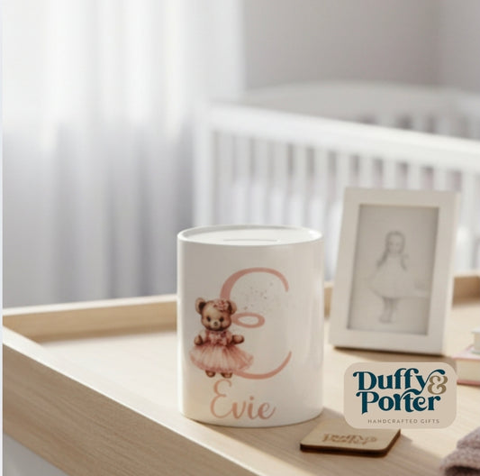 Money box. Teddy initial Pink