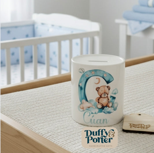 Money box. Teddy initial Blue